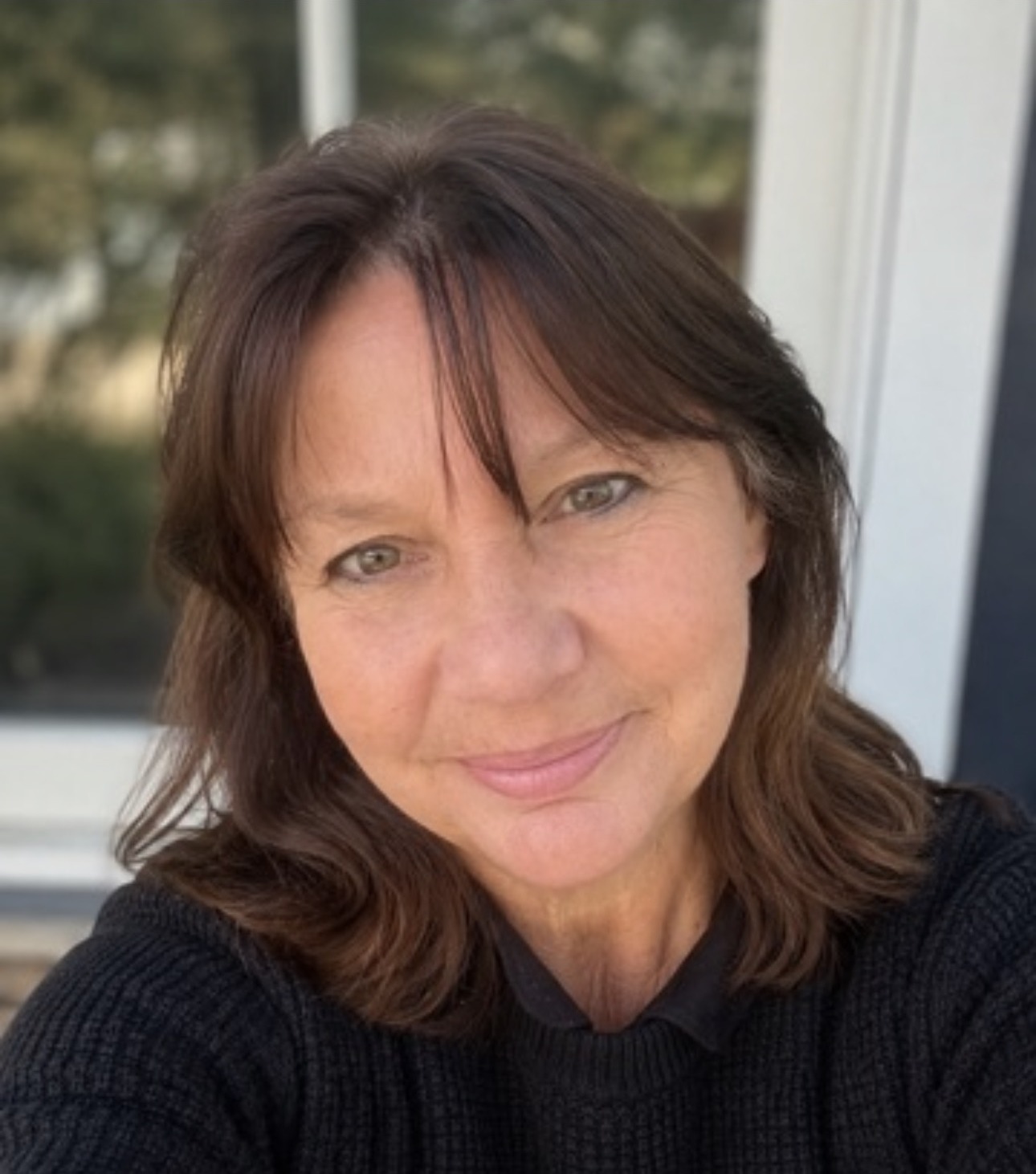 Christine Mayes, Travel Associate